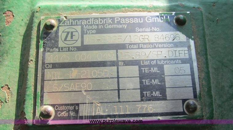 image for item J8533 2000 John Deere 6405 MFWD tractor