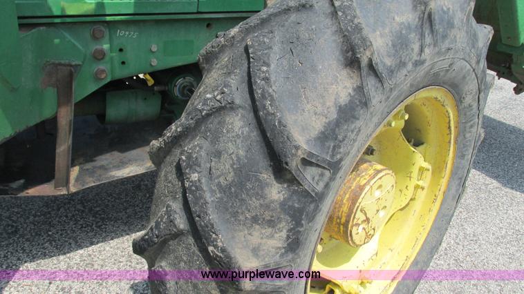 image for item J8533 2000 John Deere 6405 MFWD tractor