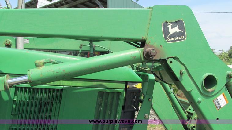 image for item J8533 2000 John Deere 6405 MFWD tractor