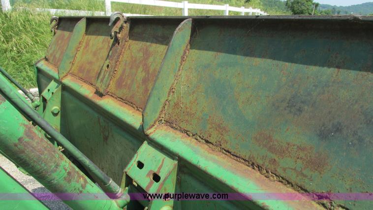 image for item J8533 2000 John Deere 6405 MFWD tractor