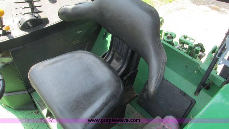 image for item J8533 2000 John Deere 6405 MFWD tractor