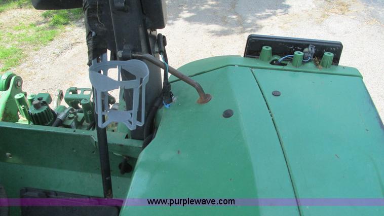 image for item J8533 2000 John Deere 6405 MFWD tractor