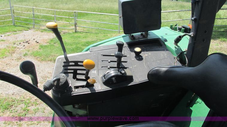 image for item J8533 2000 John Deere 6405 MFWD tractor