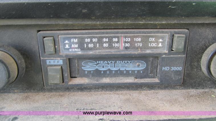 image for item J8533 2000 John Deere 6405 MFWD tractor