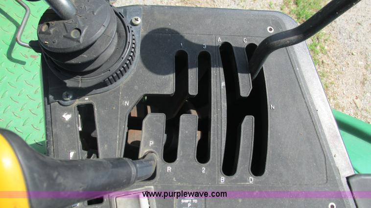 image for item J8533 2000 John Deere 6405 MFWD tractor