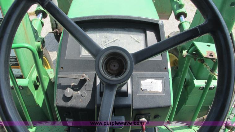 image for item J8533 2000 John Deere 6405 MFWD tractor