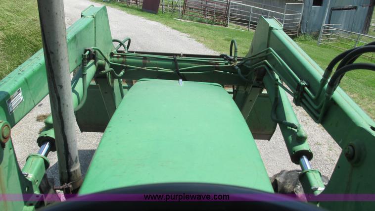 image for item J8533 2000 John Deere 6405 MFWD tractor