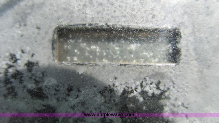 image for item J8533 2000 John Deere 6405 MFWD tractor