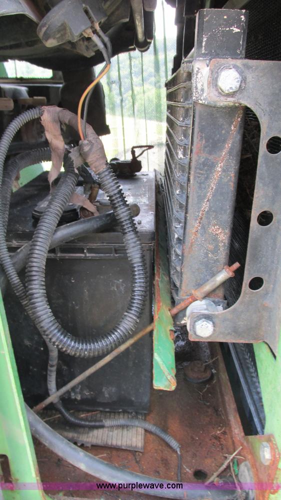 image for item J8533 2000 John Deere 6405 MFWD tractor