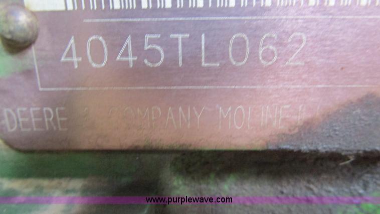 image for item J8533 2000 John Deere 6405 MFWD tractor