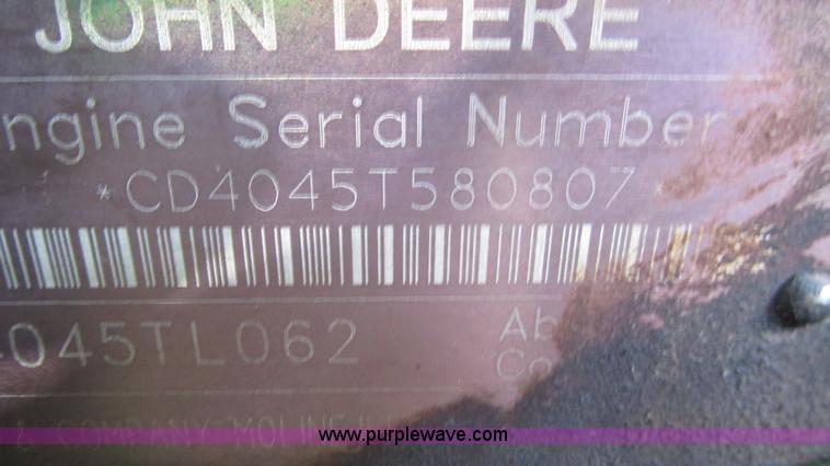 image for item J8533 2000 John Deere 6405 MFWD tractor