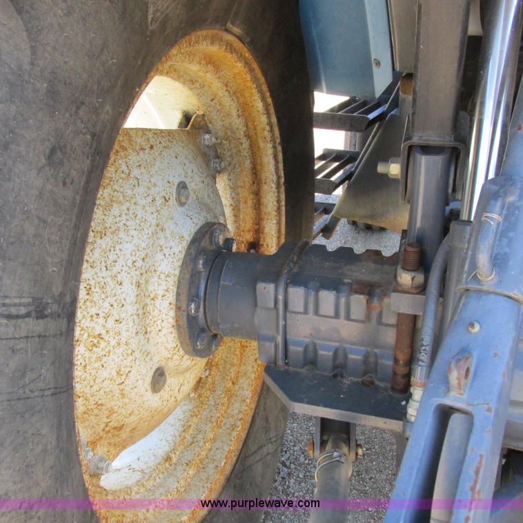 image for item K2159 1998 New Holland TS100 tractor