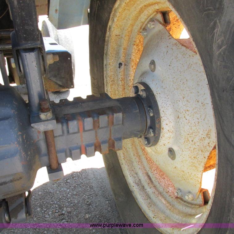 image for item K2159 1998 New Holland TS100 tractor