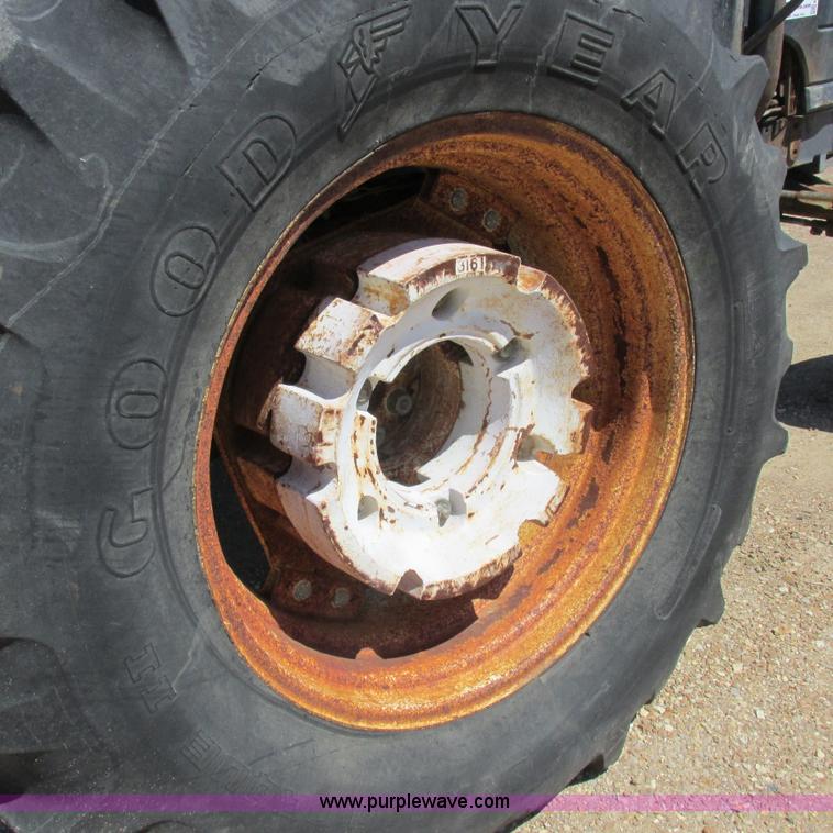 image for item K2159 1998 New Holland TS100 tractor