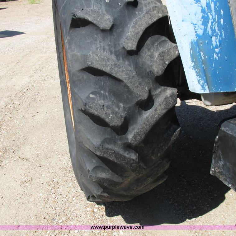 image for item K2159 1998 New Holland TS100 tractor