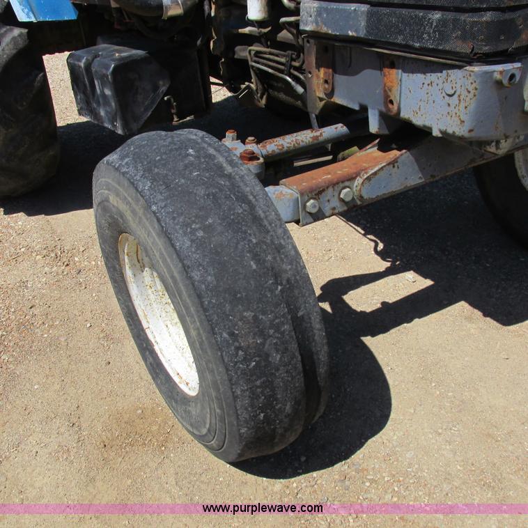 image for item K2159 1998 New Holland TS100 tractor