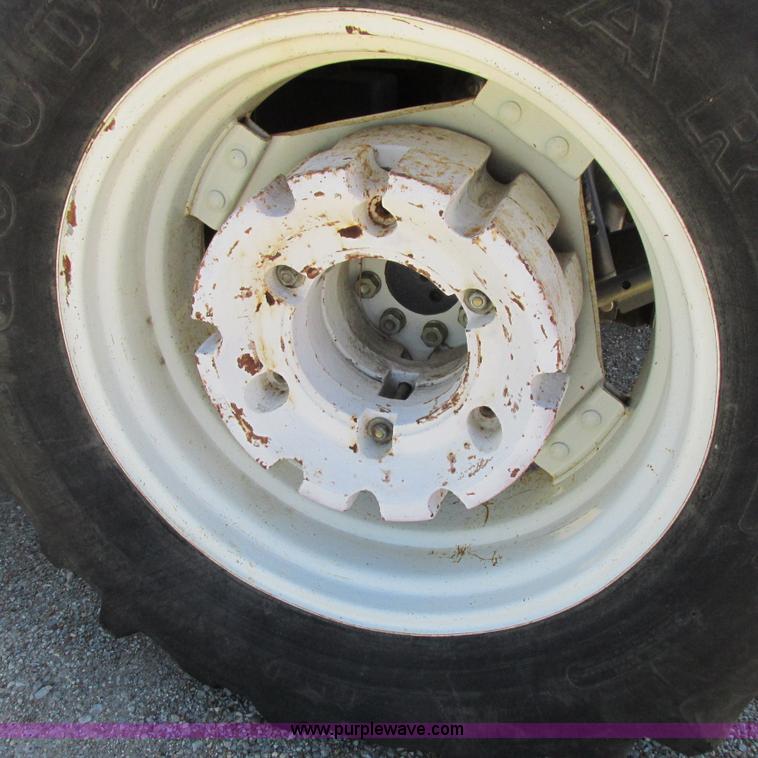 image for item K2159 1998 New Holland TS100 tractor