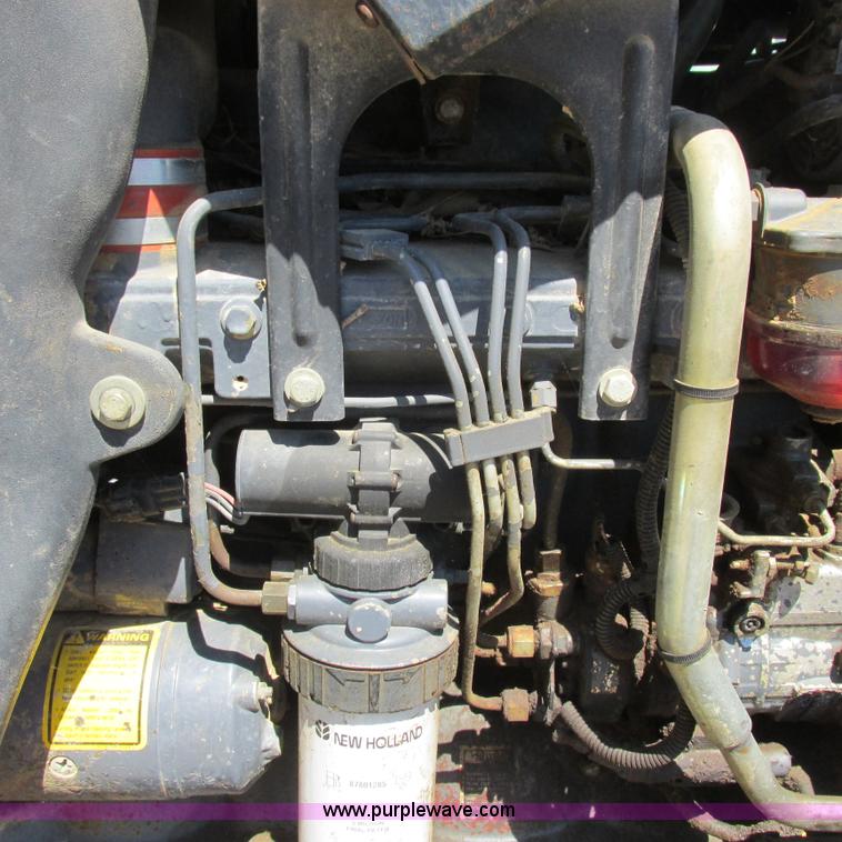 image for item K2159 1998 New Holland TS100 tractor