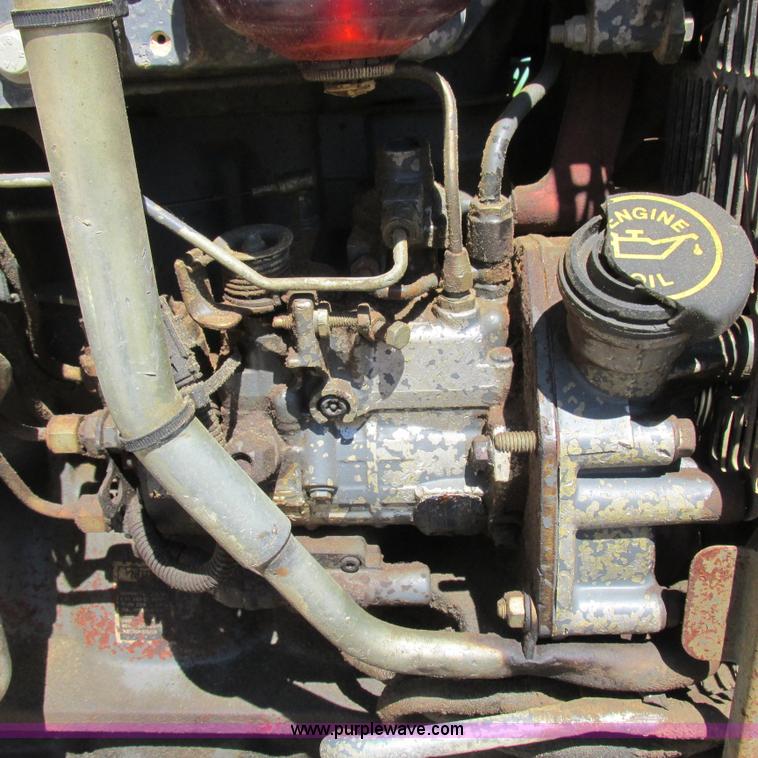 image for item K2159 1998 New Holland TS100 tractor