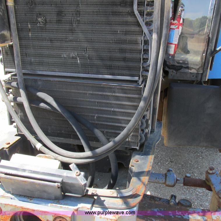 image for item K2159 1998 New Holland TS100 tractor