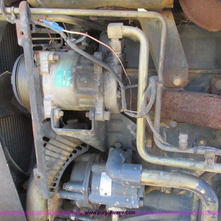 image for item K2159 1998 New Holland TS100 tractor