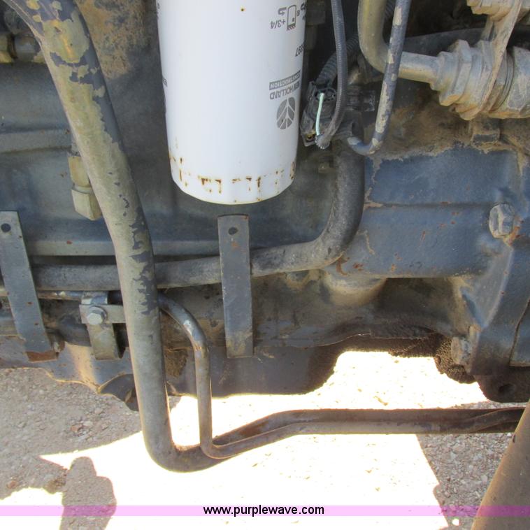 image for item K2159 1998 New Holland TS100 tractor