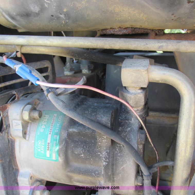 image for item K2159 1998 New Holland TS100 tractor