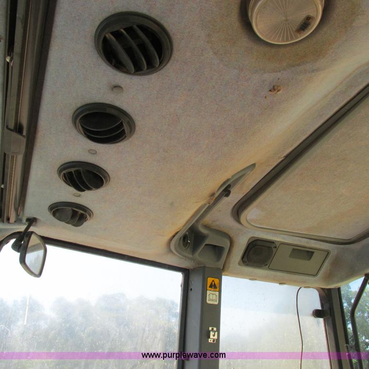 image for item K2159 1998 New Holland TS100 tractor