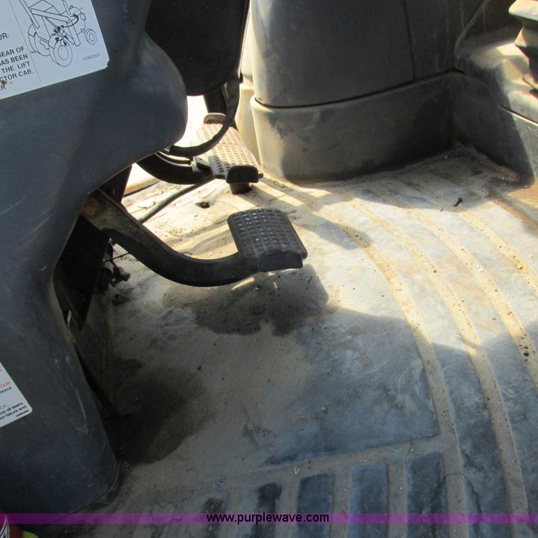 image for item K2159 1998 New Holland TS100 tractor