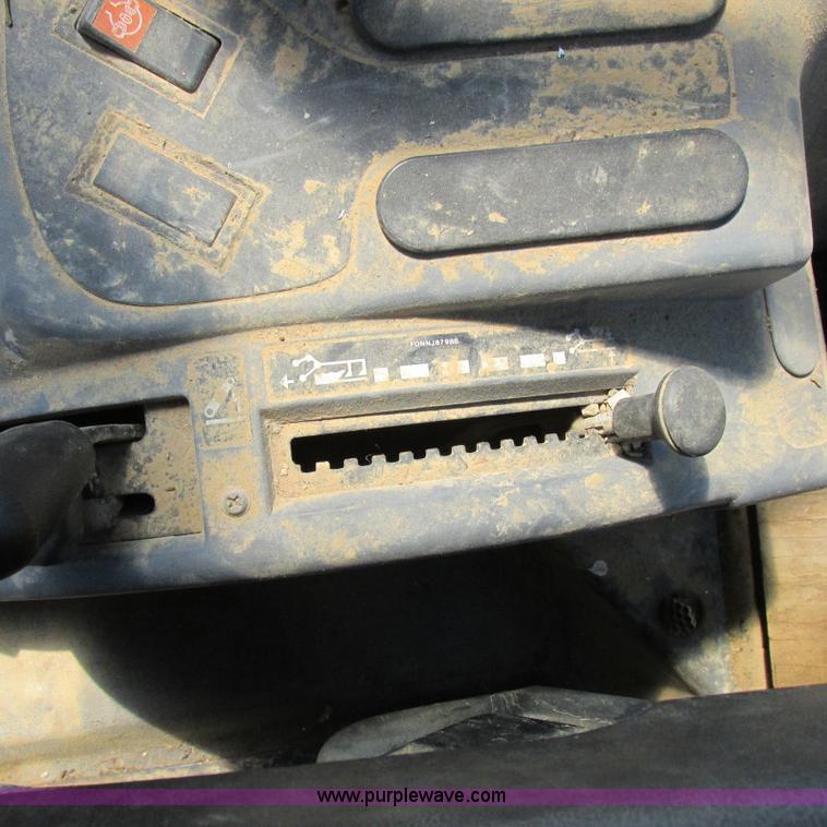 image for item K2159 1998 New Holland TS100 tractor