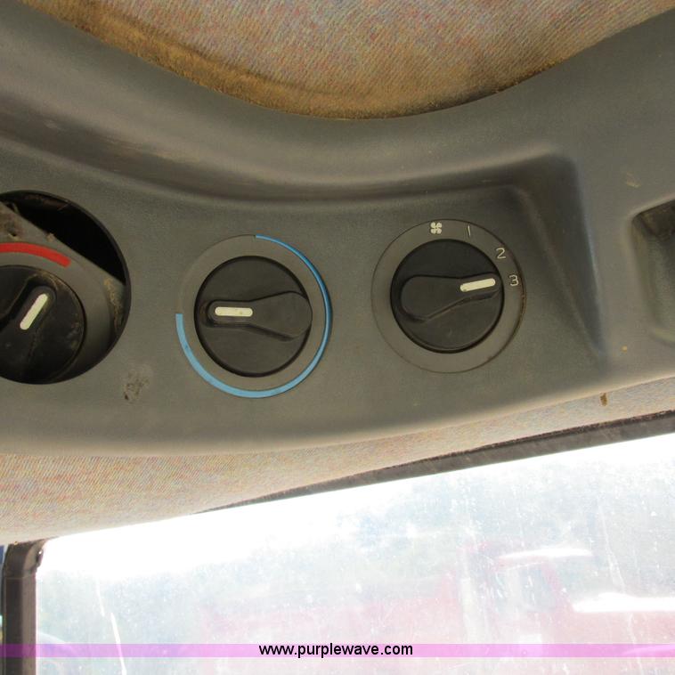 image for item K2159 1998 New Holland TS100 tractor