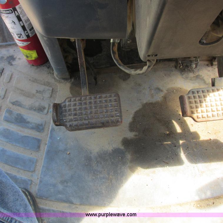 image for item K2159 1998 New Holland TS100 tractor