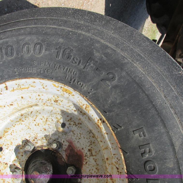 image for item K2159 1998 New Holland TS100 tractor