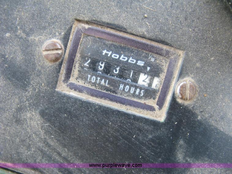 image for item K8662 1982 John Deere 2280 self-propelled windrower