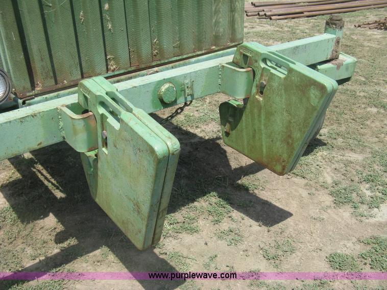 image for item K8662 1982 John Deere 2280 self-propelled windrower