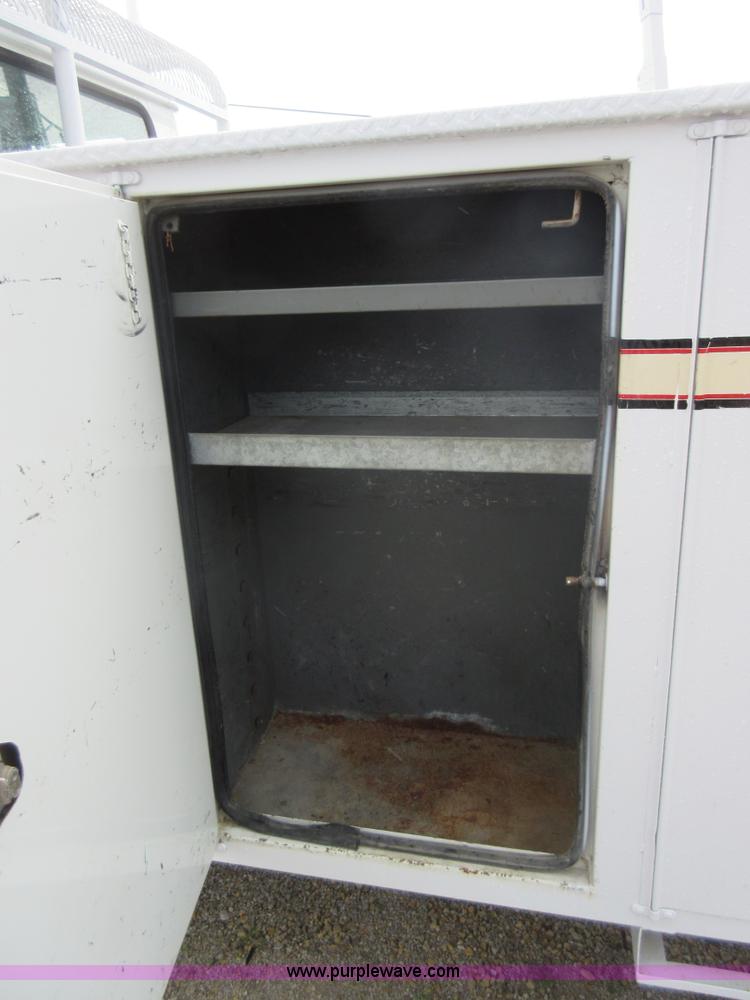 image for item G3686 1999 International 4700 bucket truck