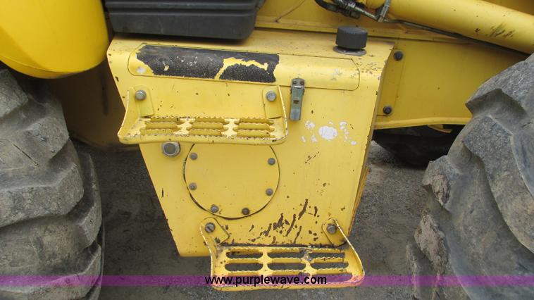 image for item I3054 2000 New Holland LB115 backhoe
