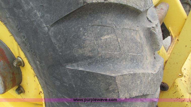 image for item I3054 2000 New Holland LB115 backhoe