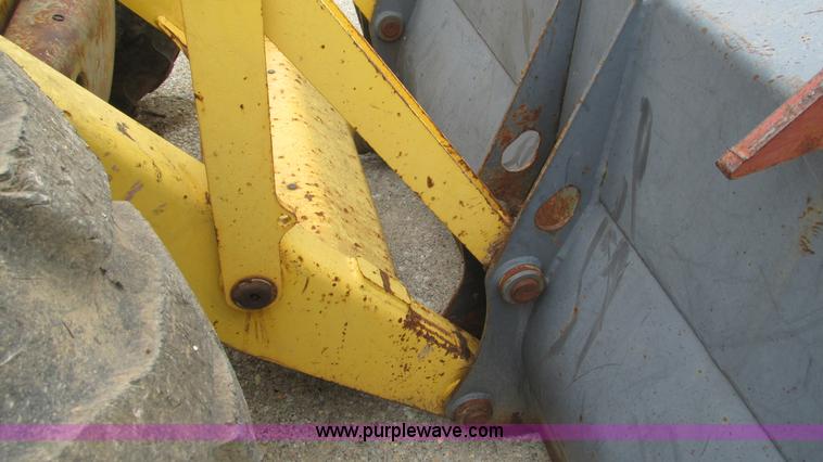 image for item I3054 2000 New Holland LB115 backhoe