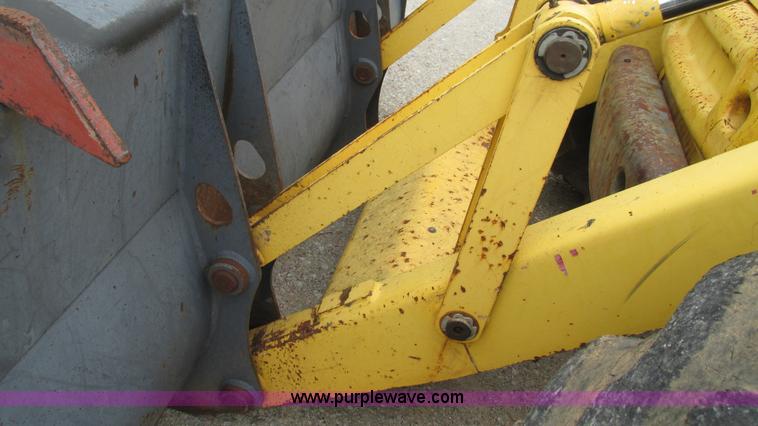 image for item I3054 2000 New Holland LB115 backhoe