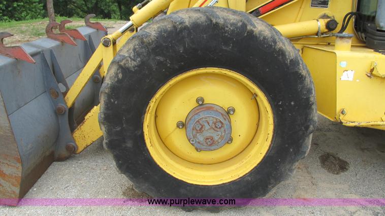 image for item I3054 2000 New Holland LB115 backhoe