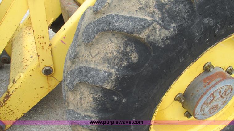 image for item I3054 2000 New Holland LB115 backhoe