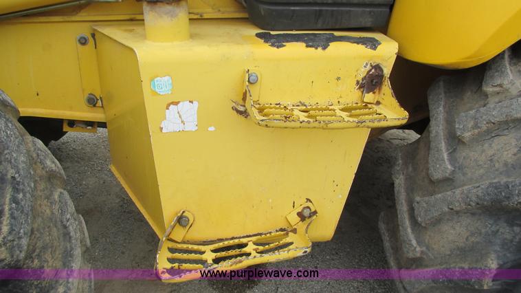 image for item I3054 2000 New Holland LB115 backhoe