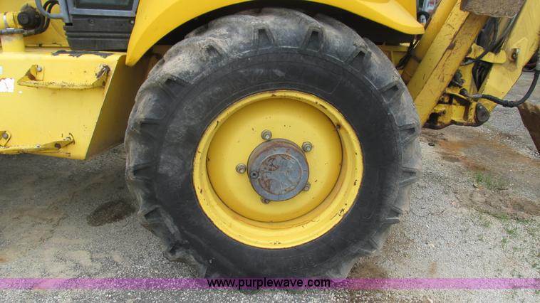 image for item I3054 2000 New Holland LB115 backhoe