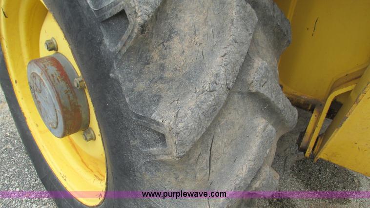 image for item I3054 2000 New Holland LB115 backhoe