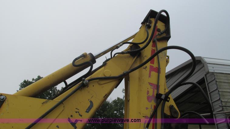 image for item I3054 2000 New Holland LB115 backhoe