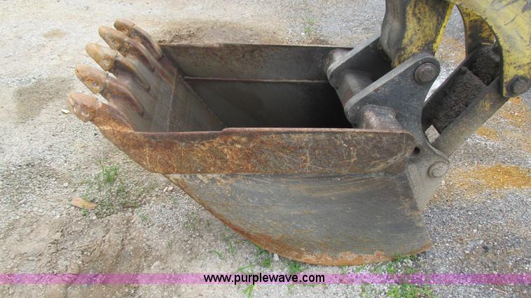 image for item I3054 2000 New Holland LB115 backhoe