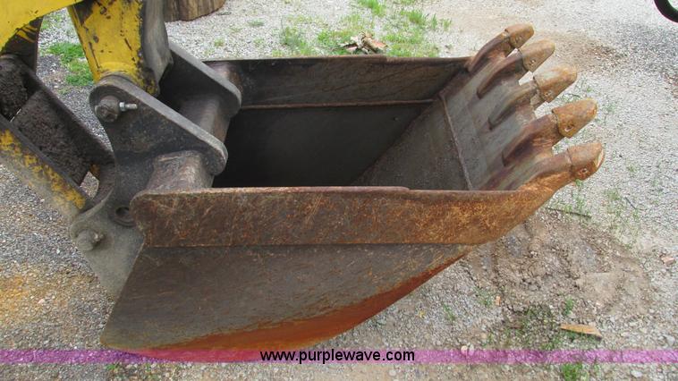 image for item I3054 2000 New Holland LB115 backhoe