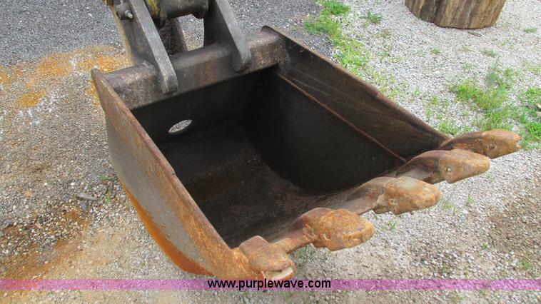 image for item I3054 2000 New Holland LB115 backhoe