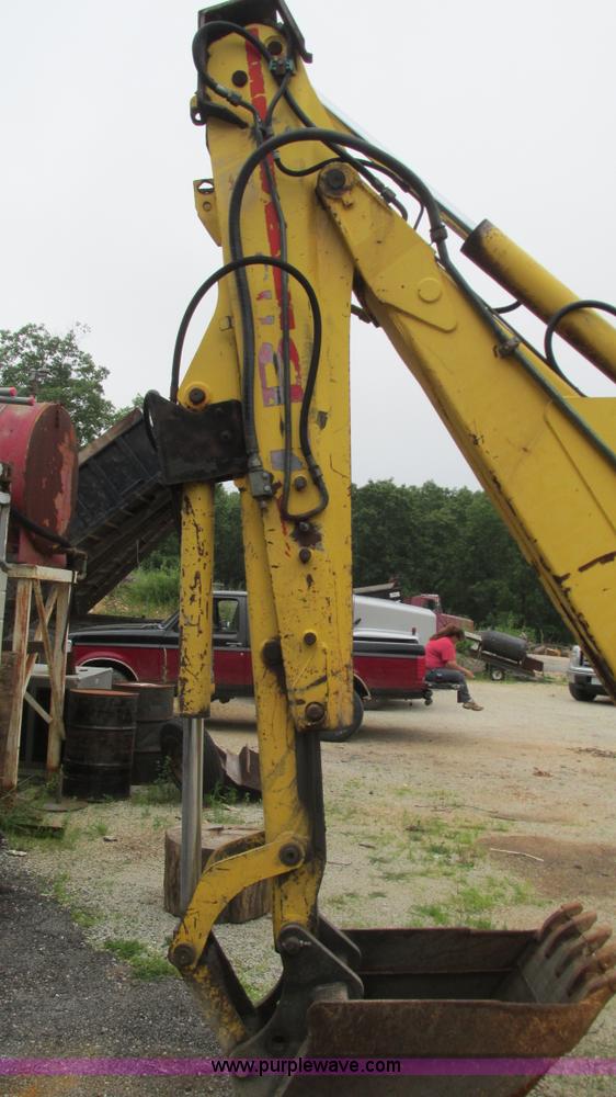 image for item I3054 2000 New Holland LB115 backhoe